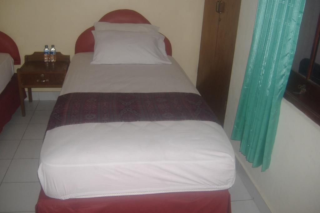 Mustika Inn Кута Стая снимка