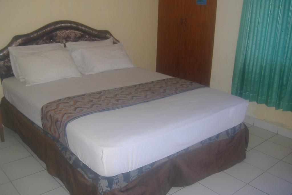 Mustika Inn Кута Стая снимка