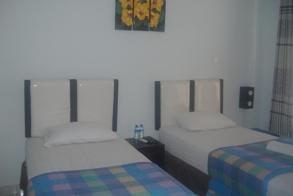 Mustika Inn Кута Стая снимка