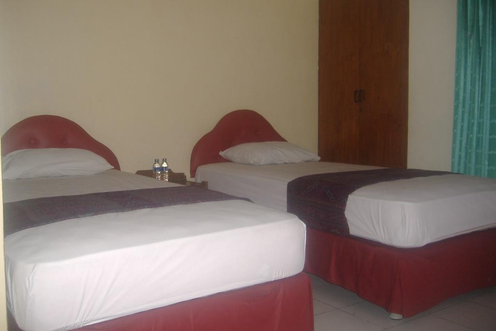 Mustika Inn Кута Стая снимка