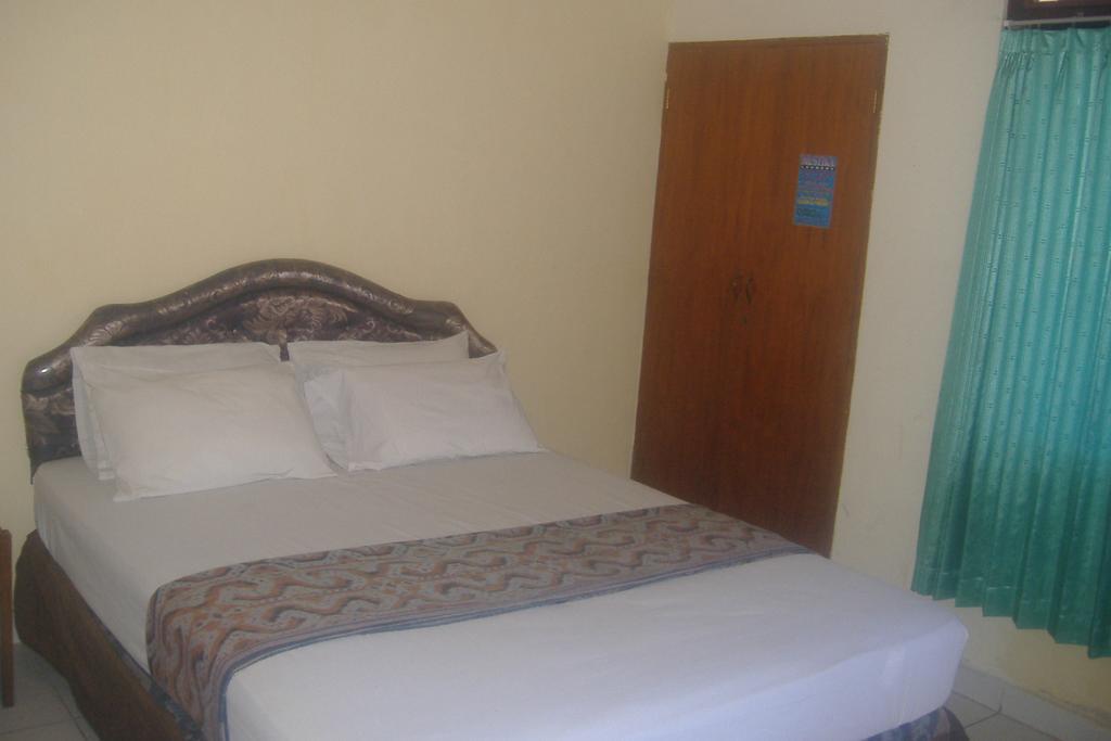 Mustika Inn Кута Стая снимка