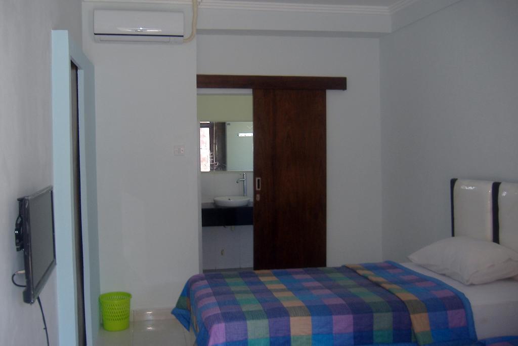 Mustika Inn Кута Стая снимка