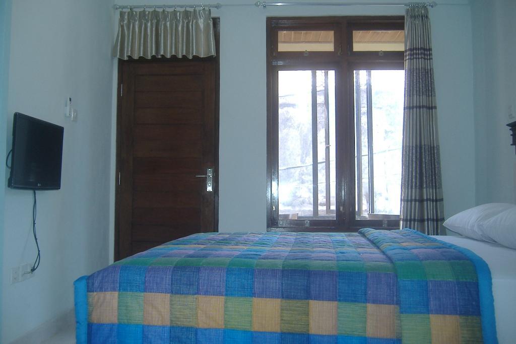 Mustika Inn Кута Стая снимка