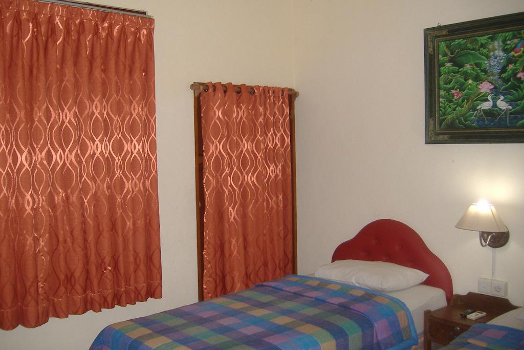 Mustika Inn Кута Стая снимка
