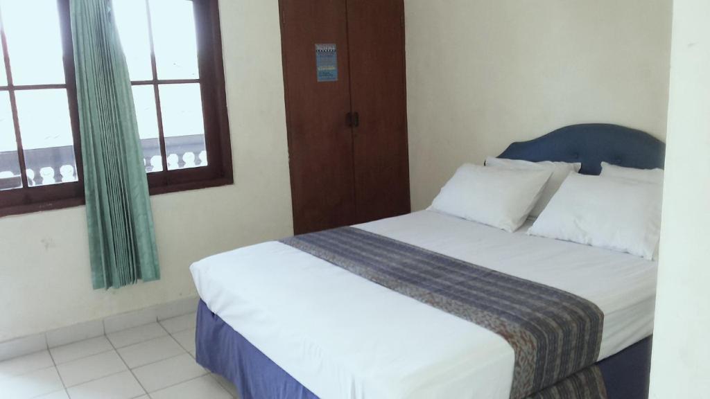 Mustika Inn Кута Стая снимка